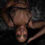 Beautiful boudoir photo of strong black woman with natural hair