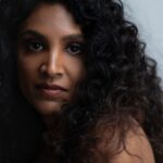 Beautiful boudoir photo of strong black woman with natural hair