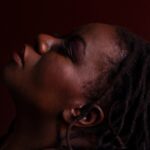 Striking portrait of strong black woman with locs
